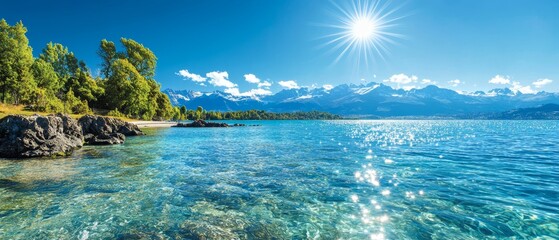 Fototapeta premium The sun gleams over the crystal-clear, blue lake A backdrop of majestic mountain ranges completes the scene