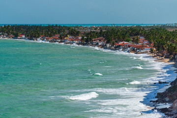 Sea level rise. Sea invading homes in Baía da Traição, Paraíba, Brazil on November 13, 2012