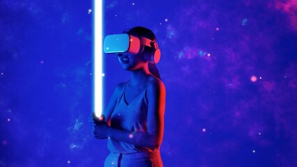 Woman player using VR transfer to fantastic metaverse fencing game looking material holding sword laser fantasy gaming space with lighting bokeh on blue smoke meta 3D cyberspace world. Hallucination.