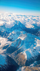 Obraz premium Aerial view of snow capped peaks and clouds in Australia, showcasing stunning landscapes