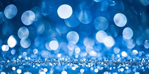 Abstract bokeh background with bright blue lights creating a stunning shimmer effect.