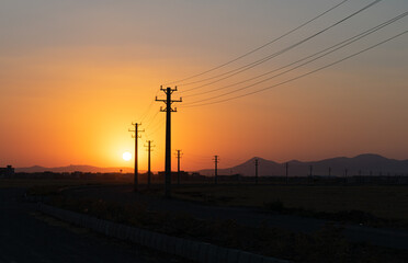 power lines in sunset