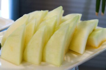 Close-up of melon slices on a buffet in the hotel restaurant