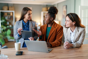 Diverse Team of Businesswomen Working with Technology