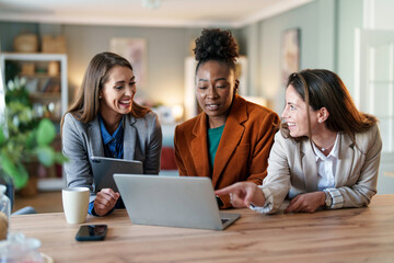 Diverse Team of Businesswomen Engaged in a Creative Office Workshop