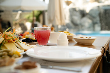 Fresh Juice by the Poolside Breakfast Table