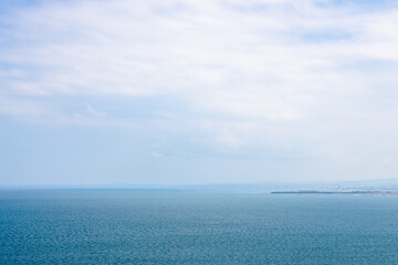 haze sky over blue water of Lake Sevan, Armenia