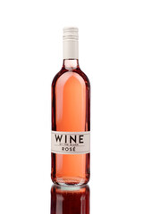 A studio shot of a rosé wine bottle, elegantly displayed on a reflective surface with a white backdrop. The soft lighting highlights the bottle's pink hues and delicate presentation, giving it a fresh