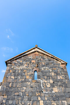 black facade of S Arakelots church in Sevanavank
