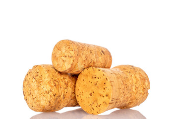 Three wine corks, macro, isolated on white background.