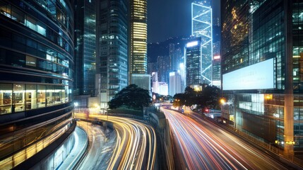 A vibrant cityscape at night showcasing illuminated skyscrapers and busy traffic.