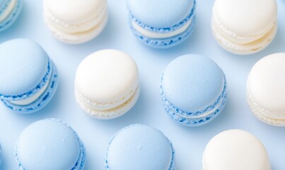 Obraz premium Delicate Light Blue and White Macarons Arranged Artfully on a Pastel Background