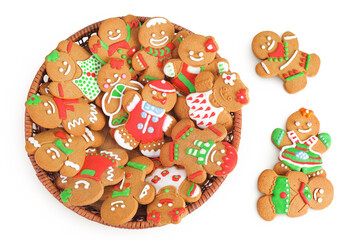 christmas gingerbread cookie in a wicker basket isolated on white background. Top view. Flat lay