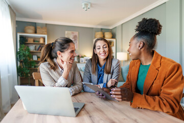 Diverse Female Entrepreneurs Working at Home