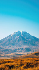 Fototapeta premium Majestic Mount Ararat under clear skies, showcasing its snow capped peak and surrounding landscape