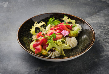 gourmet salmon salad on a dark rustic background