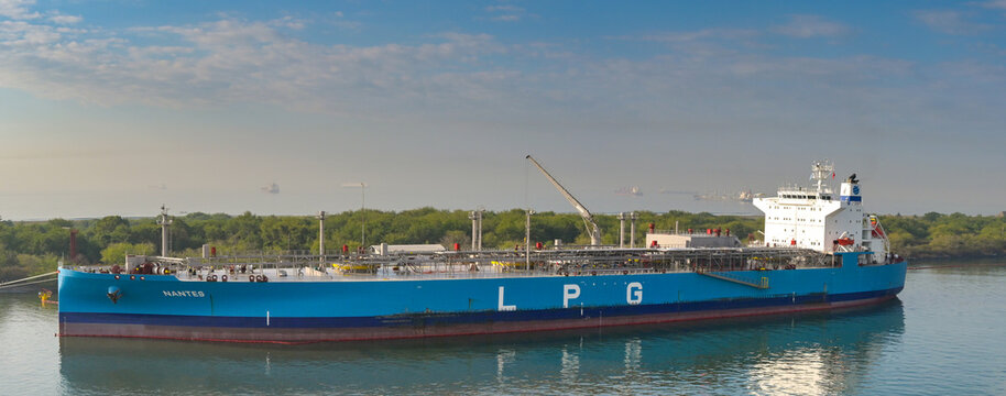 Puerto Quetzal, Guatemala - 19 January 2024: panoramic view of tanker ship Nantes carrying liquid petroleum gas or LPG docked in the county's port.