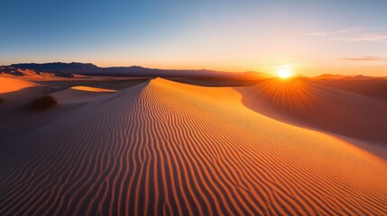 A serene desert landscape at sunset, showcasing undulating sand dunes and vibrant colors.