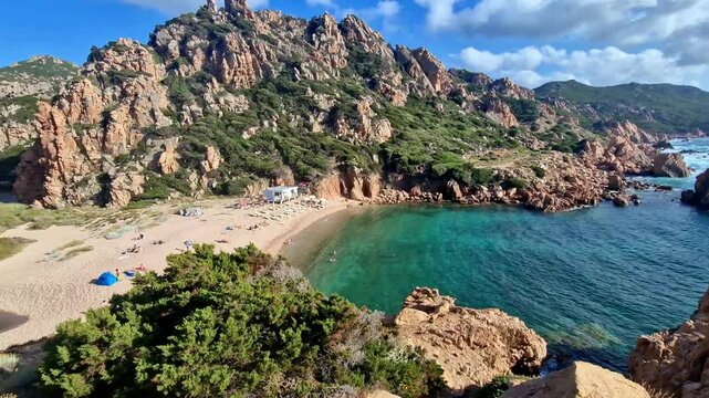Most beautiful beaches of Saerdegna island , northern part, Costa Paradiso - Cala li Cossi beach with scenic red rocks. 4k hd video