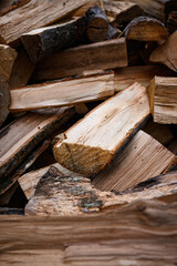 Chopped firewood in a large pile. The prepared power source is ready for combustion.	
