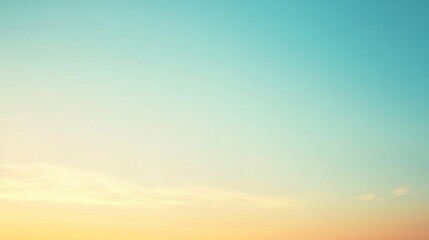 Obraz premium A clear sky displays a soft gradient of colors, where shades of sky blue gently merge with warm oranges on the horizon. Beautiful sky with a sense of serenity.