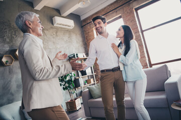 Portrait of young married couple cuddle speak consultation visit psychotherapist loft interior...