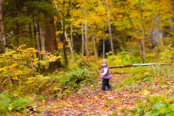 Family with kids hiking in the mountains