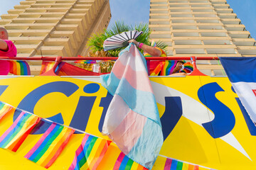 Benidorm Pride festival. Bus with rainbow pride flags during Main parade in Levante beach. European...