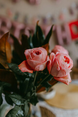 Bouquet of garden roses on the table 