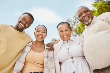 Portrait, couple and senior parents outdoor for love, laugh or African people together in low angle. Face, happy mother and father with adult son, family or daughter in law at garden on holiday below