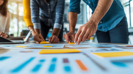 collaborative team working together around a table, hands visible, using sticky notes to brainstorm ideas. The scene emphasizes teamwork, creativity, and problem-solving