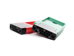 Washing machine meter switch or jetons. Individual electricity usage. Used in multi dwelling buildings laundry room to record individual electricity costs. Selective focus. Lucerne, Switzerland.