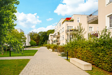 Residential area with ecological and sustainable green residential buildings, low-energy houses with apartments and green courtyard