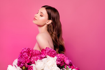 Photo of dreamy stunning woman cover her chest with pink peonies wellbeing wellness gynecology awareness concept