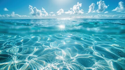 Fototapeta premium Underwater Ocean Surface with Sun Rays and Clouds