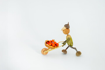 handmade craft creature made of natural materials acorns and twigs © Elena