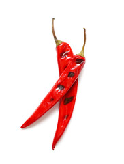 Tasty grilled chili peppers isolated on white background