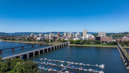 Obraz premium Late summer, early fall aerial, drone, photo of the Harrisburg Pennsylvania skyline and the Susquehanna River. September 2024.