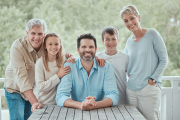 Smile, backyard or portrait of big family in home on porch to relax with love, support or care together. Group, happy or senior grandparents with children siblings for bonding or wellness in Scotland