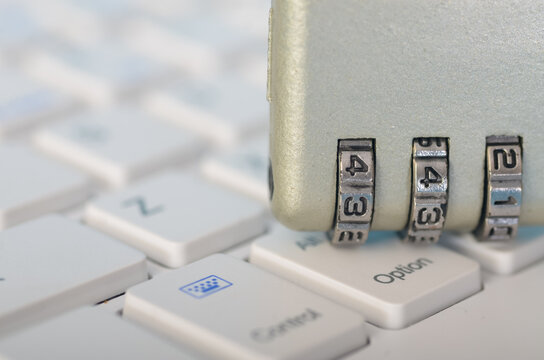 The combination lock represents the need for robust cybersecurity in today's digital world, where data breaches and cyberattacks are prevalent.