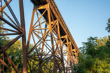 A Railroad bridge with a lot of metal and wood