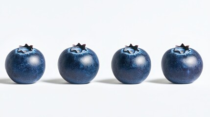 Four Fresh Blueberries in a Row on White Background