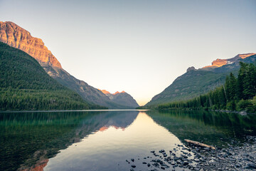 Kinnerly Peak Glows Orange In Early Morning Light Over Upper Kintla Lake In Glacier