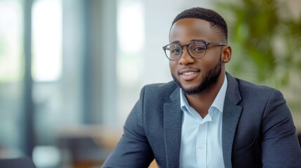 Fototapeta premium Confident Businessman in Suit and Glasses Smiling