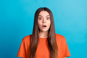 Photo portrait of pretty teen girl scared frightened face wear trendy orange outfit isolated on...