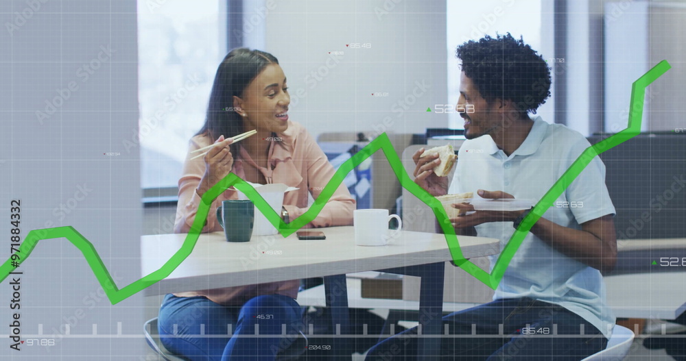 Canvas Prints Image of graph processing data over diverse male and female colleague eating at casual office