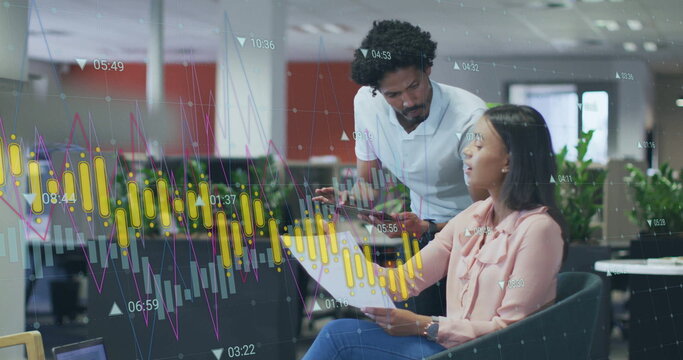 Image of graphs processing data over diverse male and female colleague talking at casual office