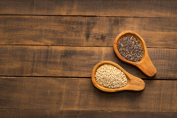 Healthy quinoa and chia seeds - Organic seeds in spoons.