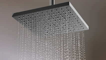Closeup Rain shower droplet water isolate on black background. front view. 3D render.
