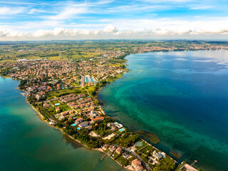 Fototapeta premium Aerial drone photo of the city of Sirmione, Garda Lake in Italy.